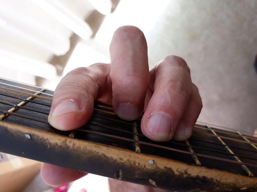 Final picture of a barre chord for my hand